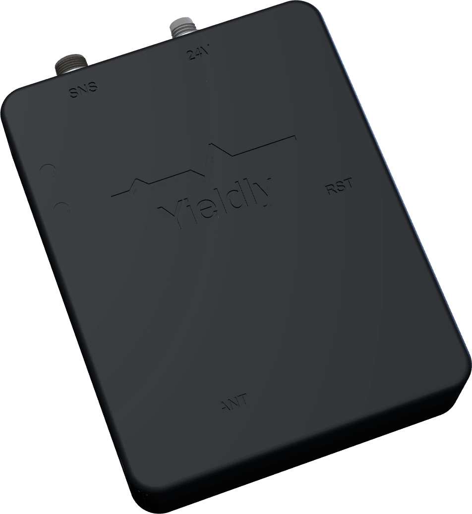 The Yieldly plug-in OEE sensor in its sealed industrial enclosure, with M8 sensor and power connectors